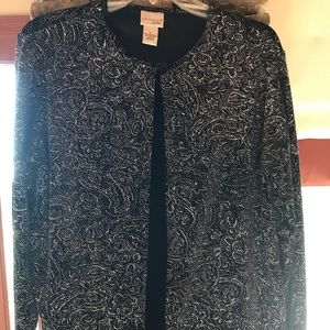 Glittery jacket with attached black shell.